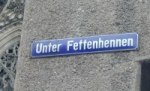 Straßenschild "Unter Fettenhennen"